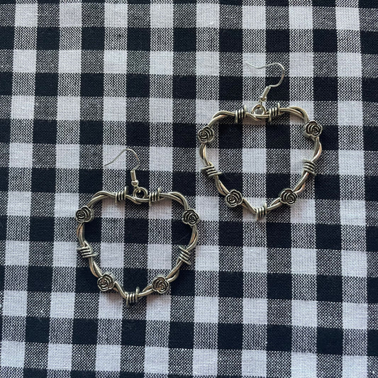 Between The Cheats Earrings